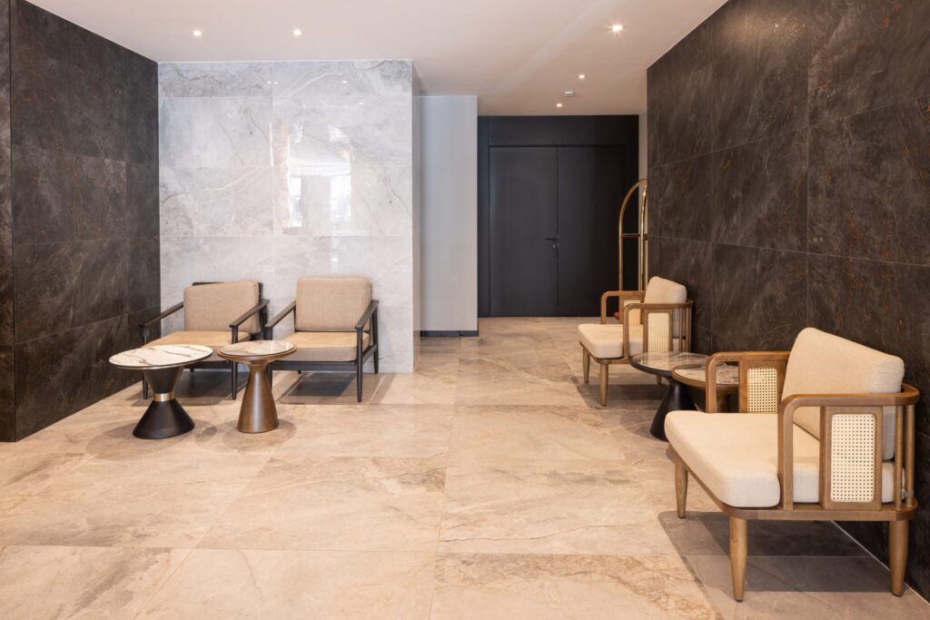 Elegant marble-floored hotel lobby with modern seating